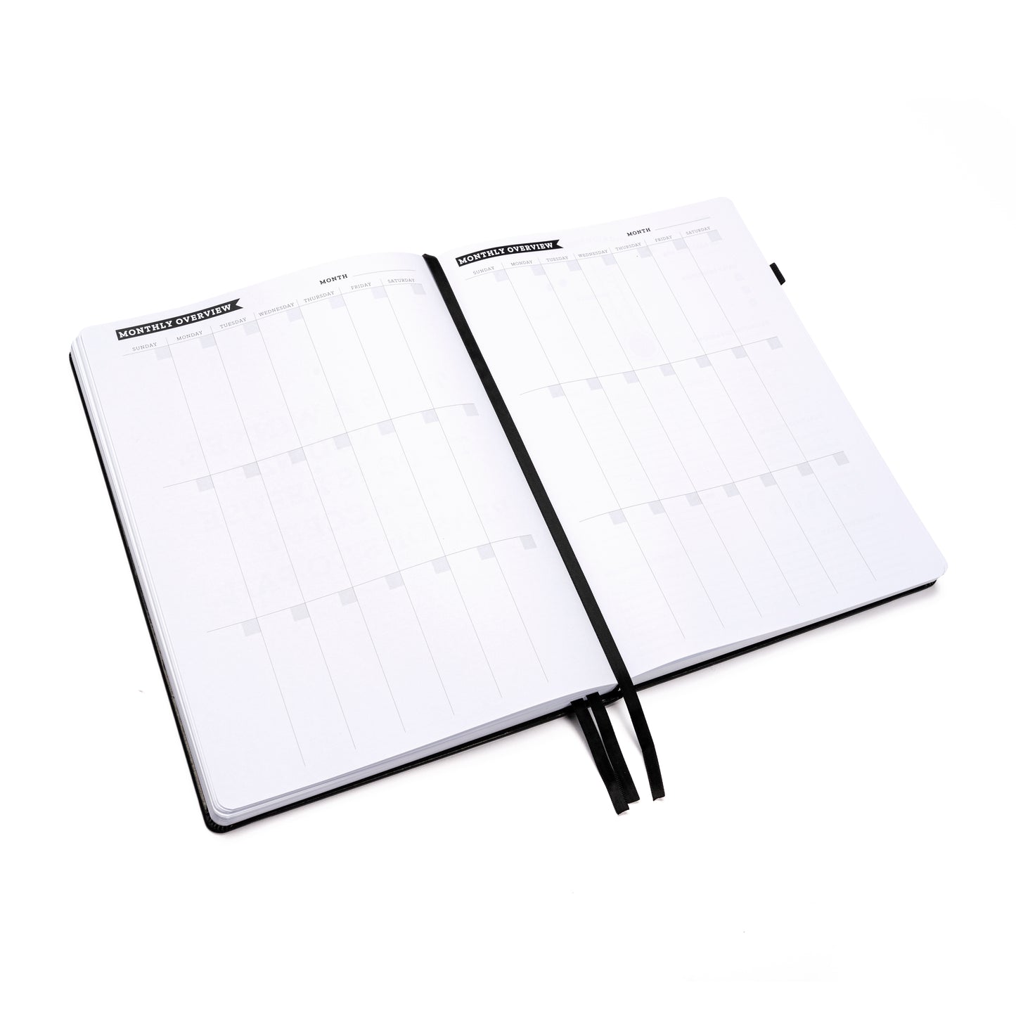 Black Ready Set Win 6-Month goal planner for productivity flat layed to two page monthly calendar with black satin ribbon in the middle.
